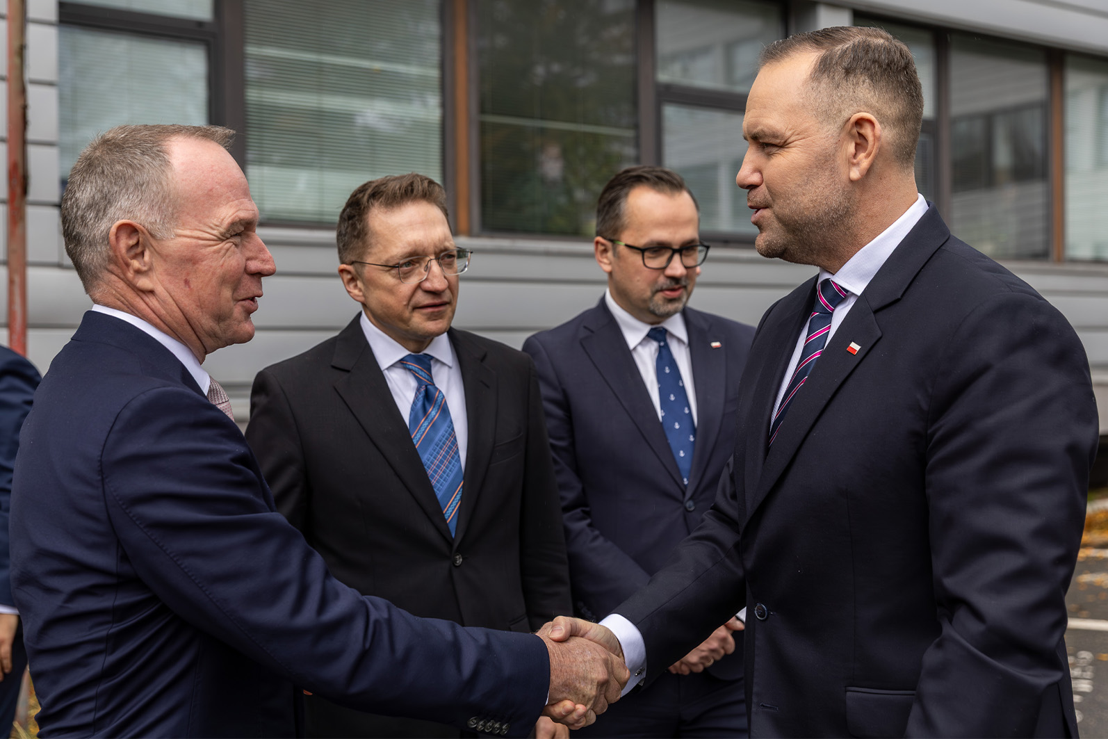 Hans-Ole Madsen (far left), ICTSI regional head for Europe, Middle East and Africa, and Wojciech Szymulewicz (second from left), BCT CEO, with Polish President Karol Nawrocki during the signing of the Yes! For Polish Ports initiative at BCT.