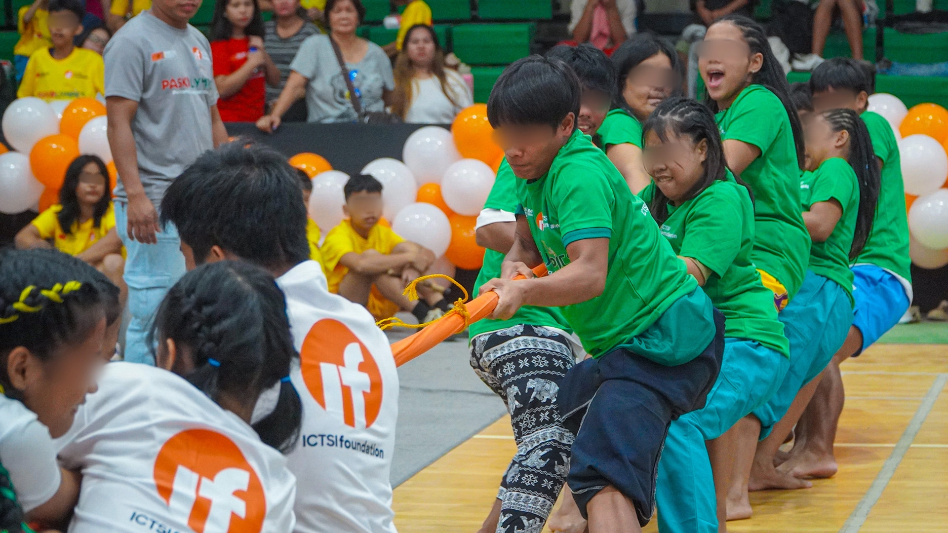 children playing tug of war