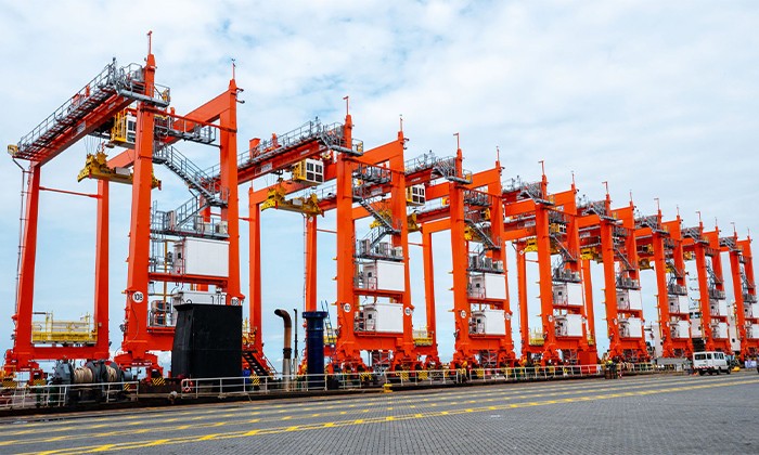 ICTSI powers MICT growth with more green cranes_thumb_0